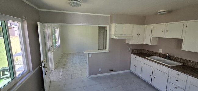 Kitchen facing living room