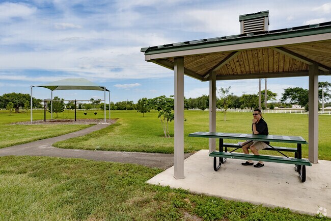 Enjoy a break in the shade at one of many parks in the Hawke's Bluff neighborhood of Davie, FL.
