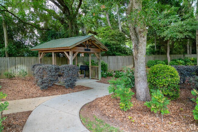 Camellias Park is a small pocket park with nice landscaping & covered picnic tables with grills.