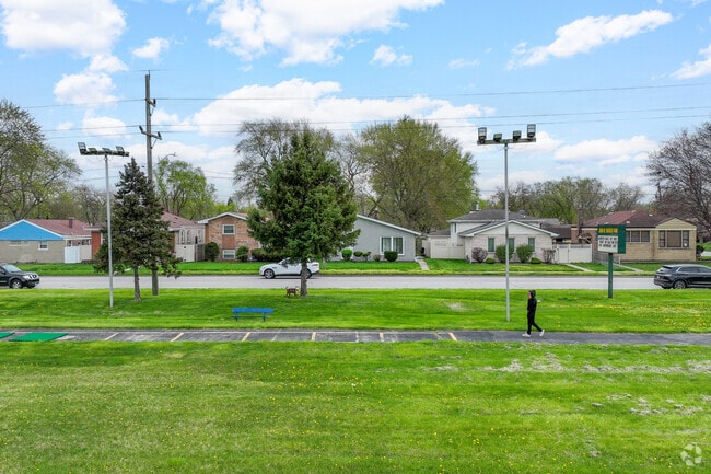 Many residents enjoy taking their dogs for a walk at John W. Needles Park.