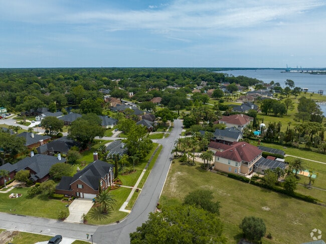 Charter point has the best of bioth worlds, water access and beautiful parks with lots of trees.