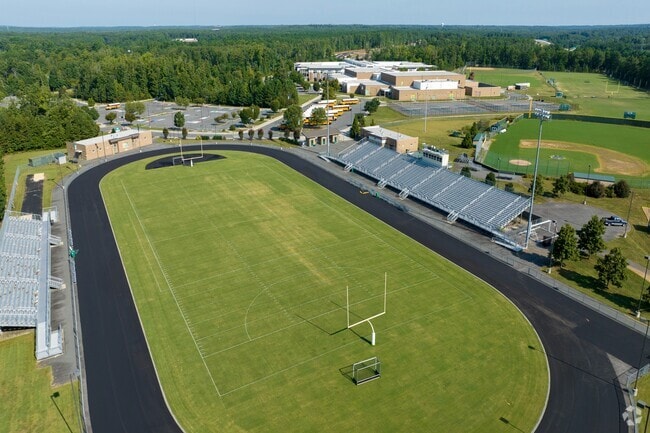 Football field and track and Clover Hill High School.