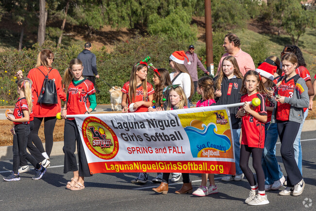 Schools and sports teams participate with pride at the Laguna Holiday Parade.