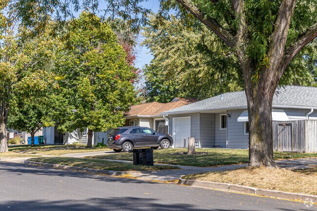 Homes in John Marshall sit in tree lined sidewalks with private driveways.