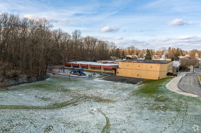 Walberta Park Primary School has a medium sized green space for children to play in.