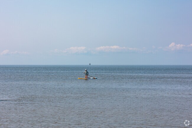 Salvo locals enjoy paddleboarding the calm waters at Salvo Day Use Area.