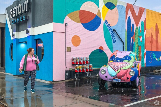 Gumball machines and a gum bug where visitors stick gum at GetOut Games in Franklin.