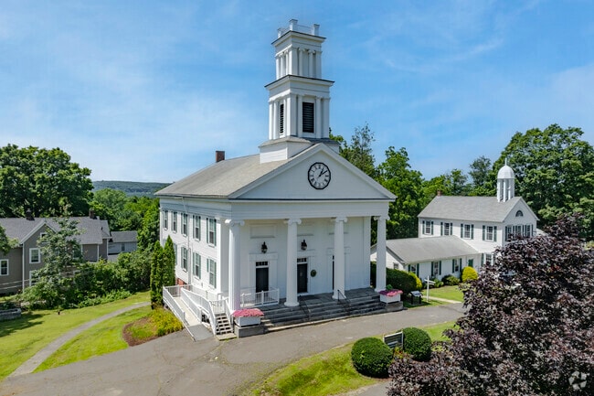The Congregational Church and Clock on the Plymouth Green are a community staple.