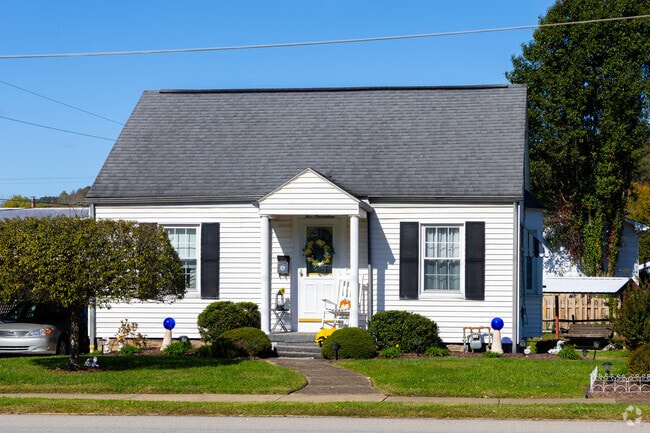 Cape Cod-style cottages in Paden City offer cozy charm and a welcoming atmosphere.