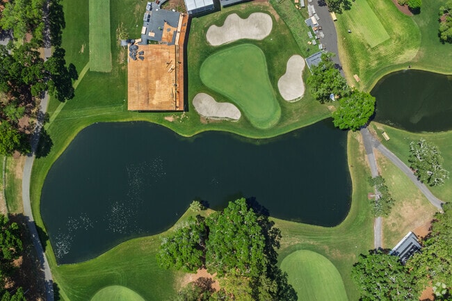 Grande Dunes features a scenic golf course with manicured greens and sparkling ponds.