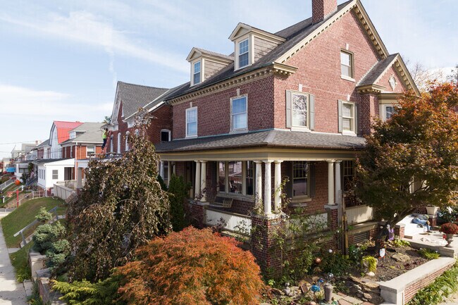 Large porches that sit above the street level on this hilly section of Red Lion, PA.