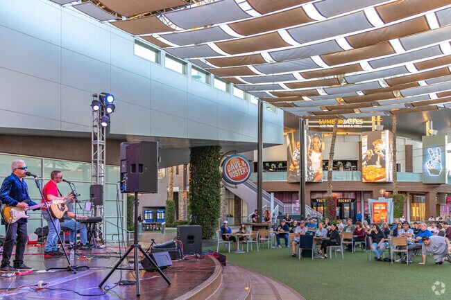 Tempe Marketplace offers live music that Apache locals enjoy.