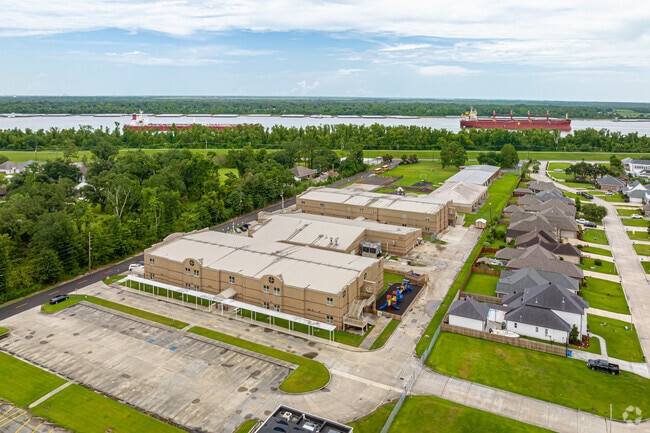 St. Rose Elementary School rests along the Mississippi River on River Road.