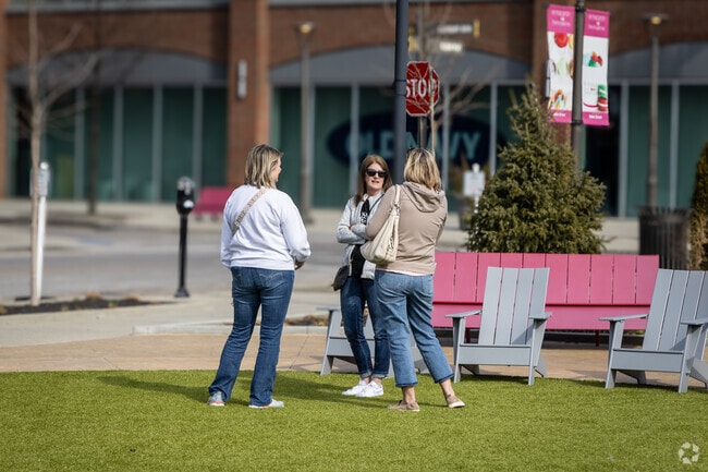 Friends at the Liberty Center gather in the green space for a great time.