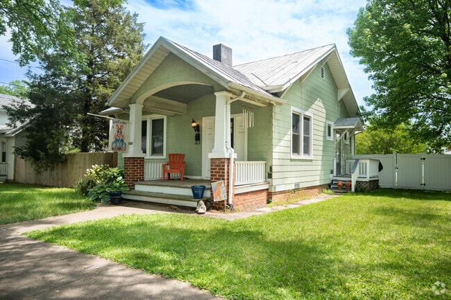 Craftsman-style homes in the Broad Rock neighborhood feature large covered front porches.