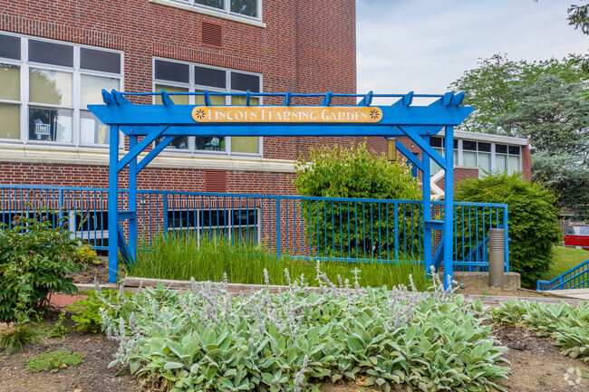 Students of Lincoln Elementary School in Emmaus tend to the school garden.