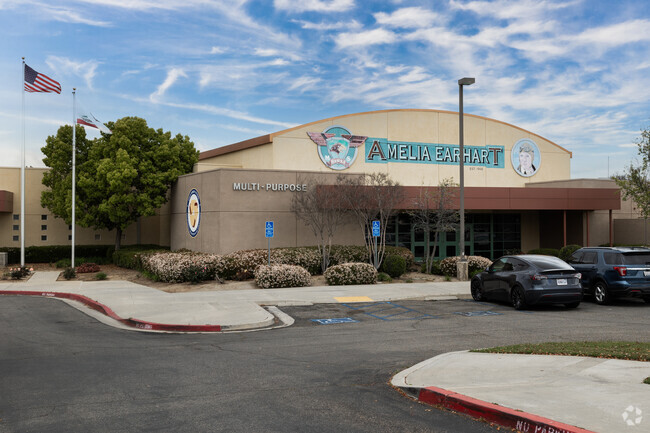 Multi-Purpose building with colorful illustrations at Amelia Earhart Middle School.