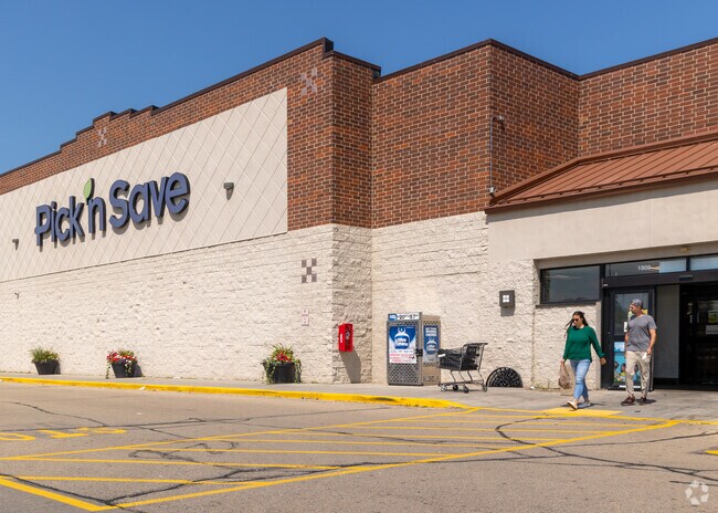 Close to home, residents buy groceries and other essentials at the Fairacres Shopping Center.