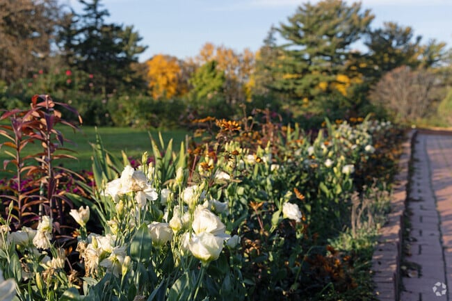 The Clemens-Munsinger Gardens showcase a dazzling display of flowers and sculptures.