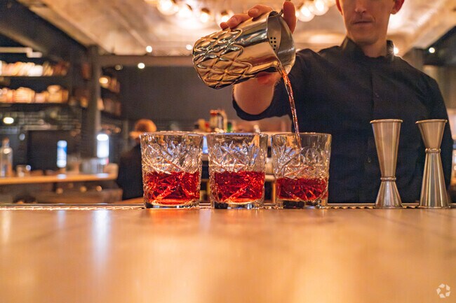 Bartenders mix up one-of-a-kind drinks at The Ledger in Downtown Salem.
