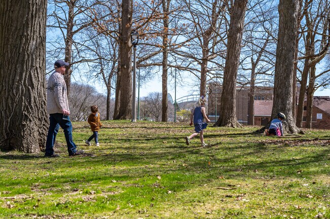 The wooded green space at Burbank Playfield in Johnson's Woods is great for exploring.