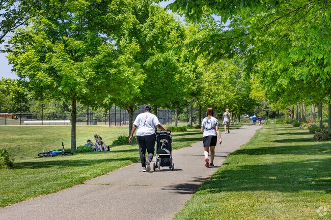Heritage Park offers a paved walking path with beautiful views around the park, in Mount Sinai.