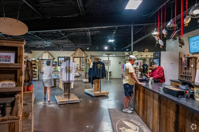 Guests buy tickets to the museum and gift shop of Duck Dynasty's Duck Commander in Brownsville.
