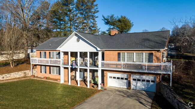 A large, two-story brick home in Lenoir.