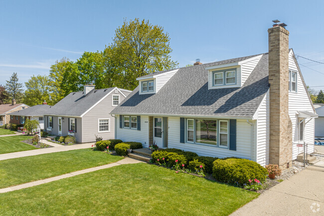 Cape Cod houses have nice-sized yards and driveways in Averill Woods.