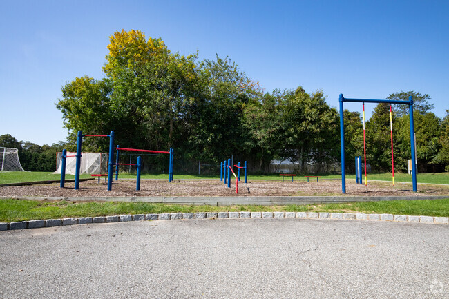 Climb the jungle gym behind Westhampton Beach Elementary School.