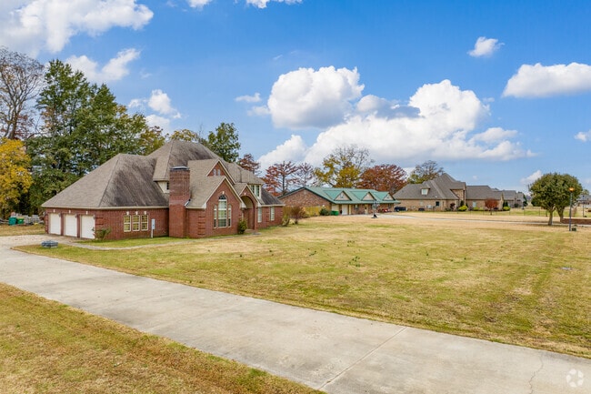 Scott homes often sit on large lots with stately architecture.