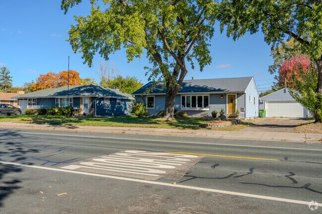 Grandview streets feature ranch-style homes with mature trees and garages.