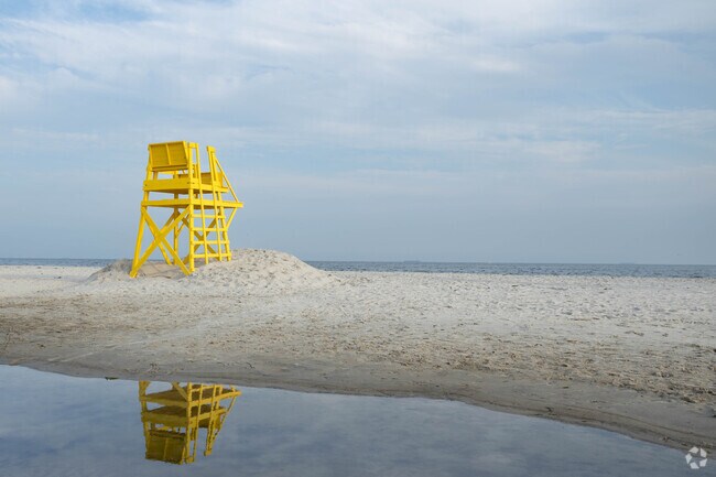 Lido Beach, NY has many lifeguards for your protection but swimming is only ok if they're there.