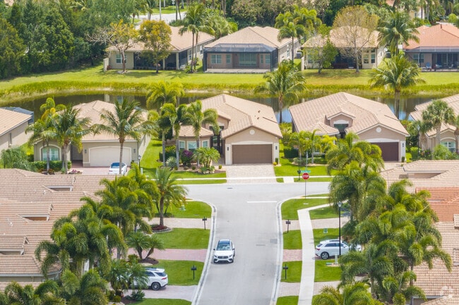 Large front windows and driveways leading to two-car garages are what you find in Valencia Cove.
