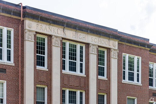 The historic front entrance of the Franklin High School in Franklin, NH.