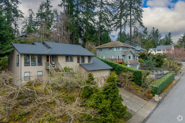 Many homes in Rosemont Summit are surrounded by ornamental trees and hedges.