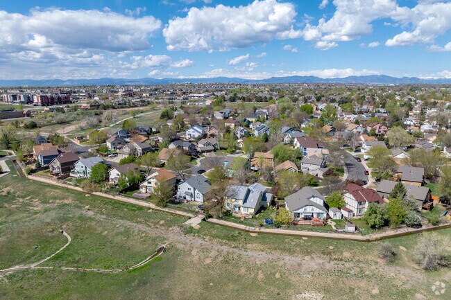 Wyndemere homes backing to open space in Thornton CO offer peaceful views extra privacy and direct access to nature.