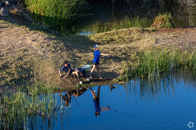 Kids love to fish at the local pond in the heart of Lake.