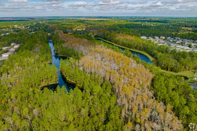 Deer Creek is surrounded by mature trees and waterways.