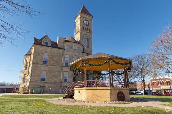 The Grundy County Courthouse features a beautiful facade and clock tower with an adjoining gazebo.