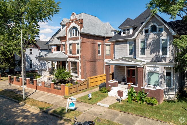 Historic Evansville homes often feature detached garages and small lawns with paved entryways.