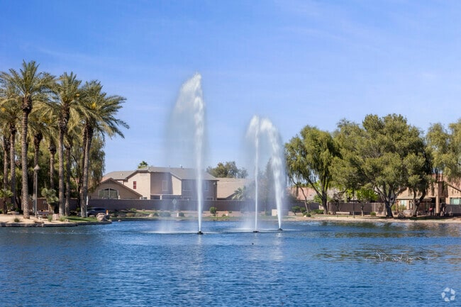 Rancho El Dorado residents are greeted to the neighborhood with a beautiful lake and fountains.
