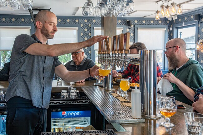 Next Whiskey Bar specializes in rare whiskies as well as local craft beer.