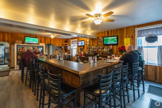 Good friends share cheer at a local pub in Bushkill Township.