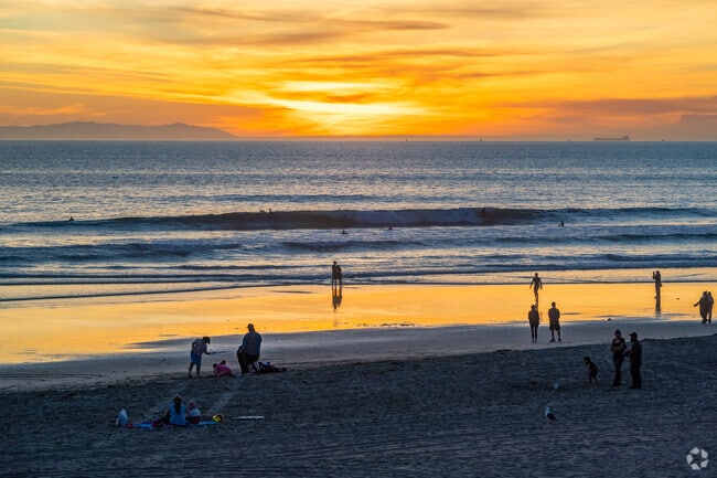 Newland residents can enjoy idyllic sunsets along the coastline of Huntington Beach.