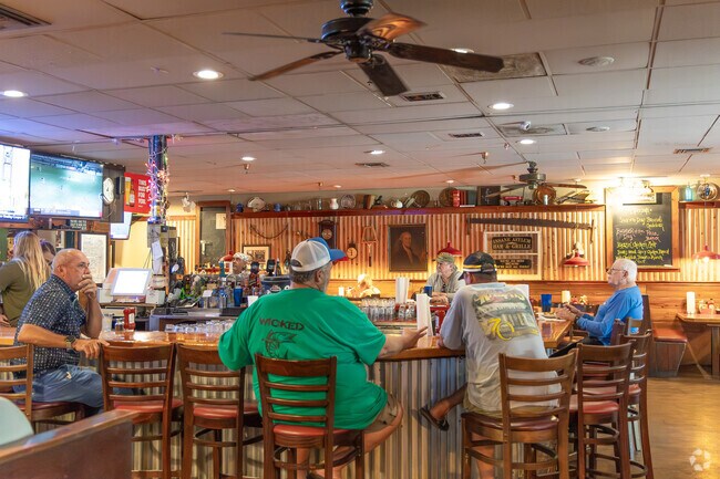Hobe Sound locals enjoy cold beer and the best burgers in town at Scooters.