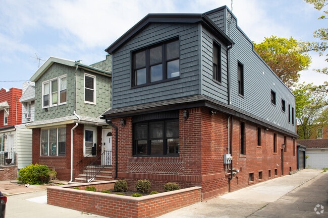 Some traditional two family townhouses within Flatlands have been modernized.