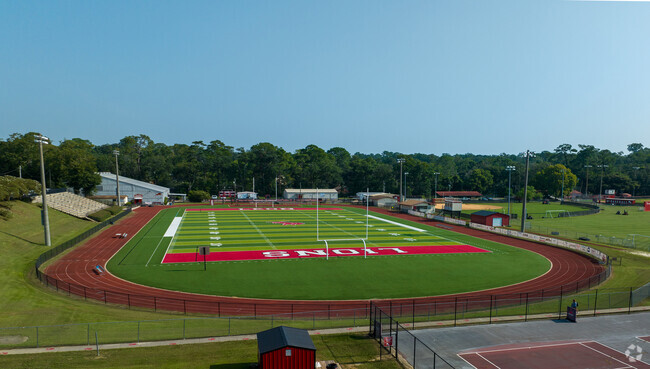 Enjoy a Friday night football game at Leon High School.