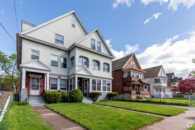 Three family houses are a dominant presence in Barry Square.