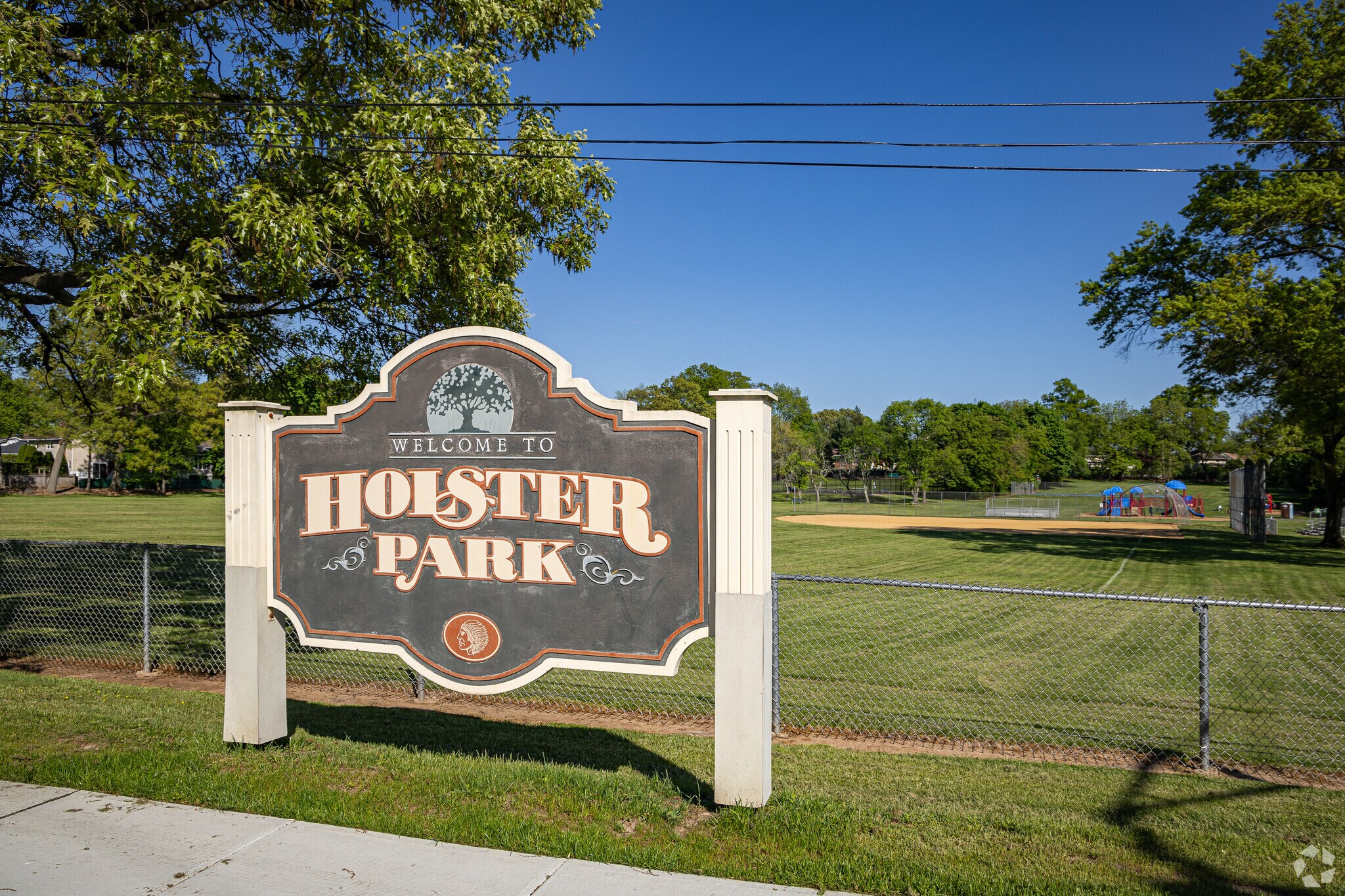 Holster Park features basketball and tennis courts and is located next to School #16.